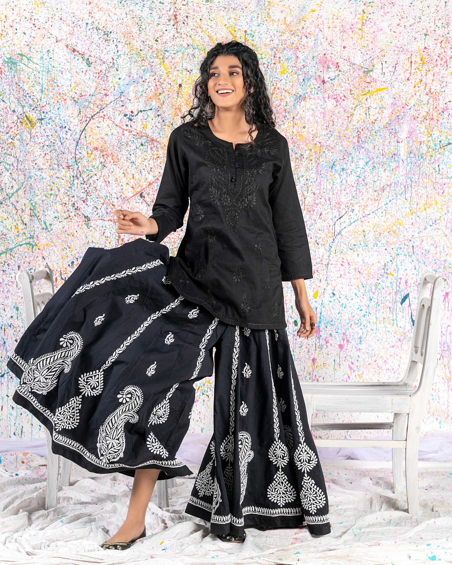 Aafrinish Rehma zaman black kurti black embroidery Chikan Kari Kurta Black on Black Splatter painting curly hair