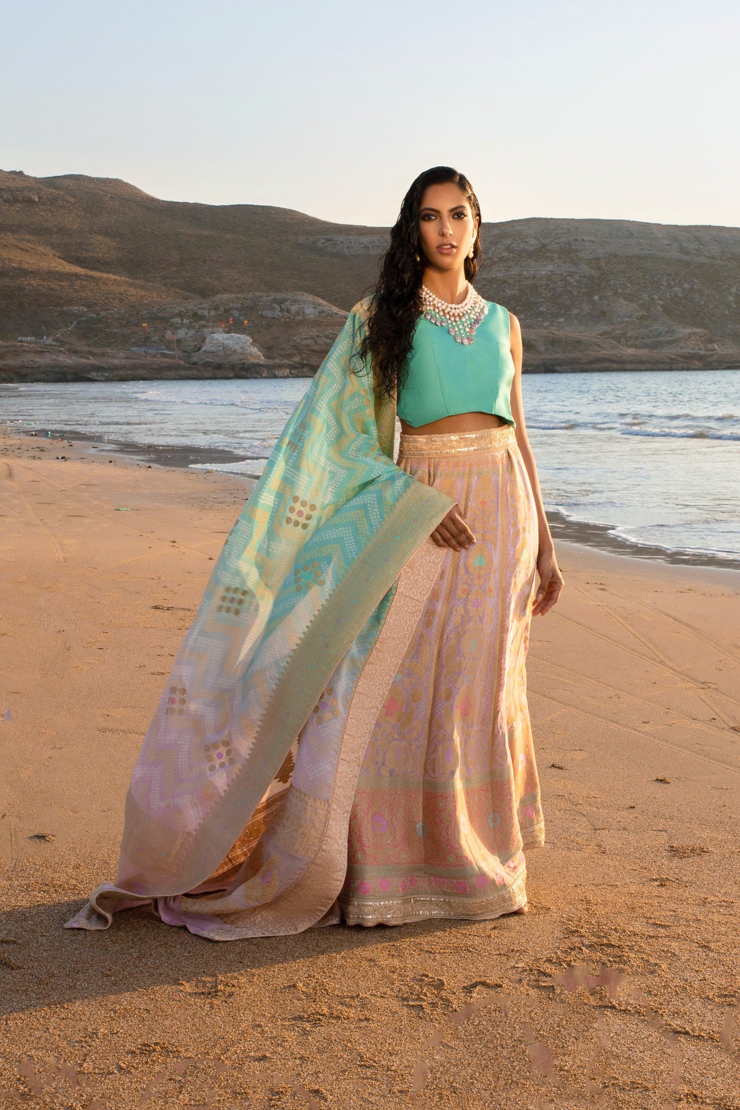 Aafrinish By Niazi Nimra Jacob Gibran Jamshed Mubarak Village Beach Pastel pink, Lavender and Turquoise Lehnga Choli Pakistan Fashion Soothing
